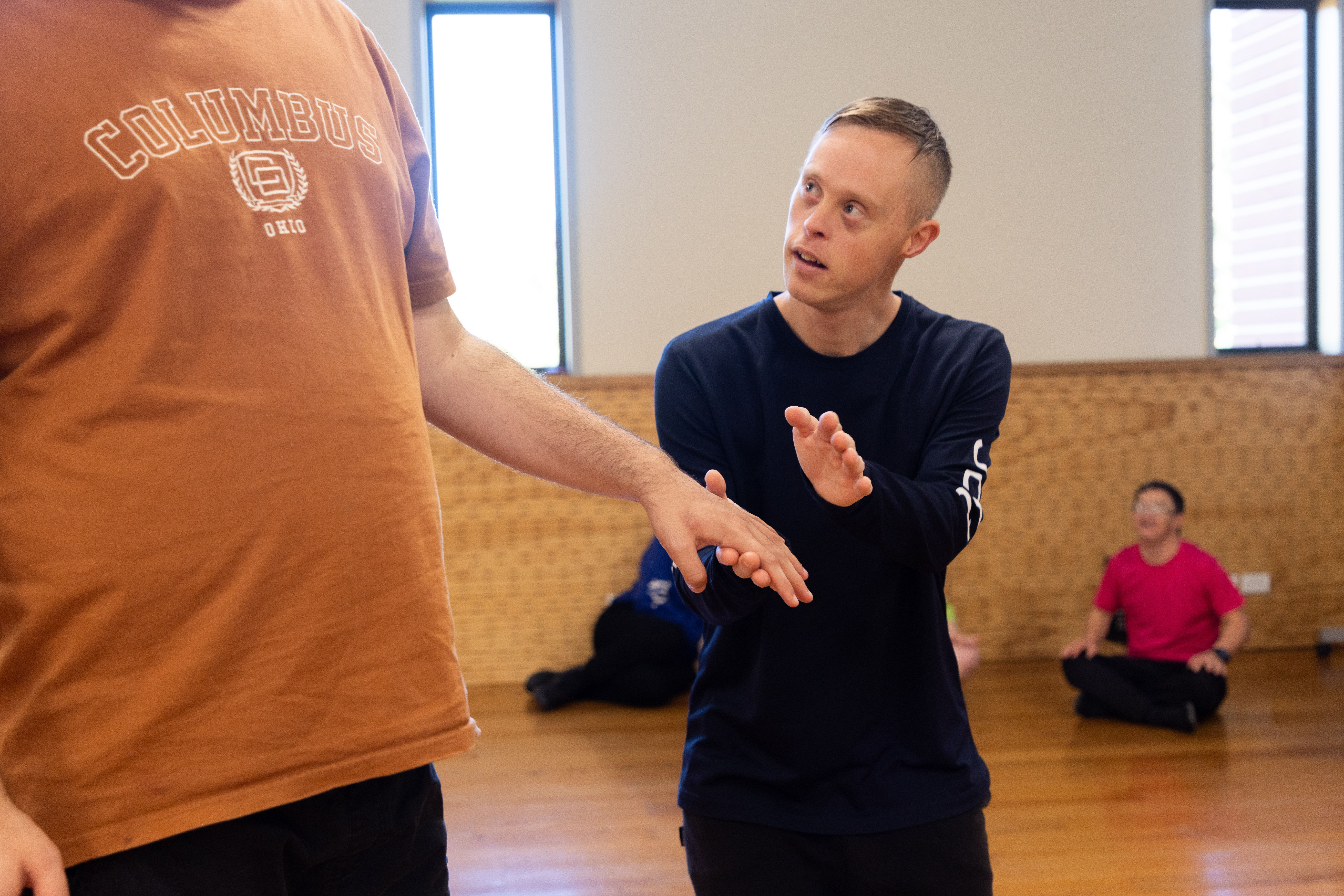 Move tutor Joel Forman working one on one with James.jpg